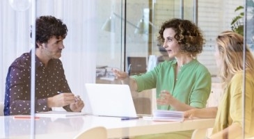 Professionals working in office