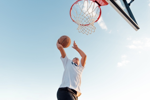 Boy playing basketball