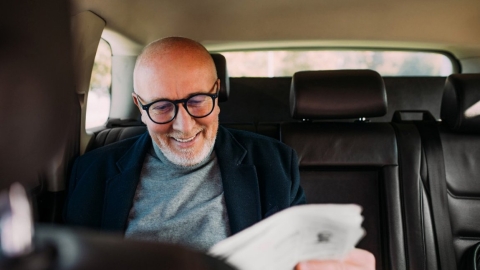 Business man reading the newspaper